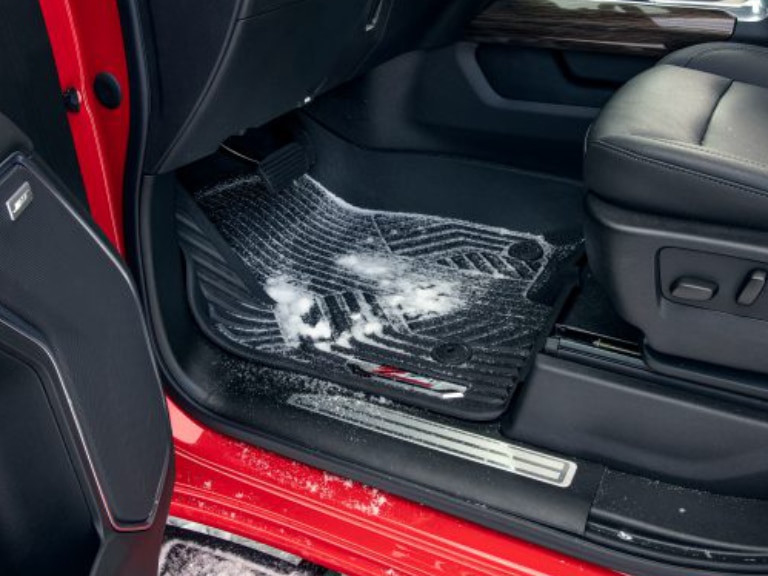 First-Row Premium All-Weather Floor Liners in Jet Black with Chrome Z71 Logo (for Models with Center Console)/